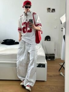 Y2K fashion mens graphic tee and cargo pants outfit.